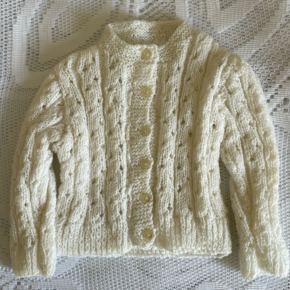 Child’s hand crocheted sweater. NWOT